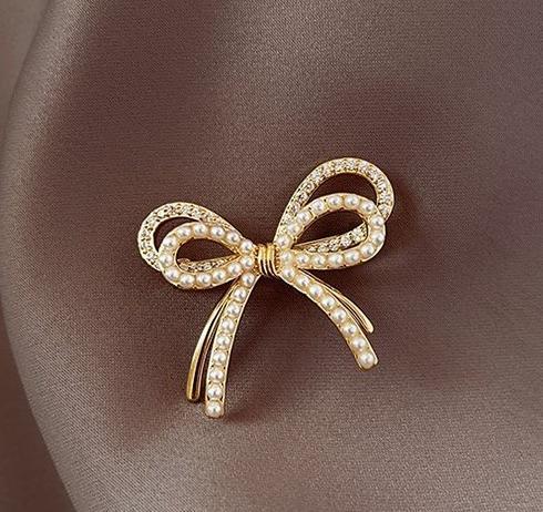 Butterfly knot pearl brooch, high-end women's style, niche design, anti glare chest flower, fixed clothes, pin accessories, trendy