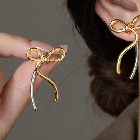 Korean high-end gold and silver contrasting earrings, simple ribbon bow earrings, female personality, sweet and irregular earrings