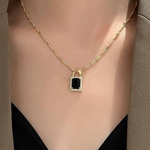 Micro inlaid exquisite black zircon lock pendant necklace for women, 2024 new trendy, light luxury temperament, high-end feeling collarbone chain