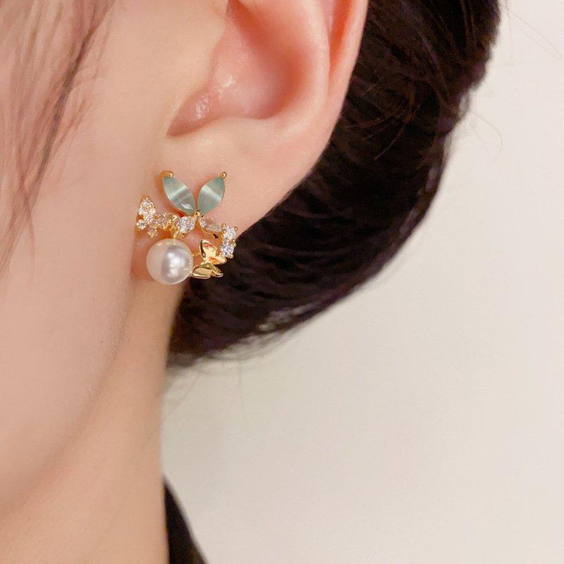 Japanese and Korean small fresh breeze zircon butterfly pearl earrings, niche luxury s925 silver stud post anti allergy female earrings and earrings