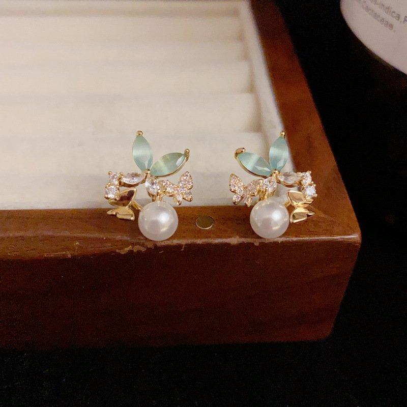 Japanese and Korean small fresh breeze zircon butterfly pearl earrings, niche luxury s925 silver stud post anti allergy female earrings and earrings