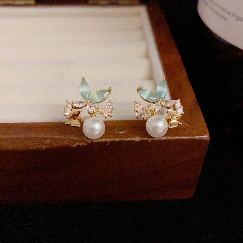 Japanese and Korean small fresh breeze zircon butterfly pearl earrings, niche luxury s925 silver stud post anti allergy female earrings and earrings