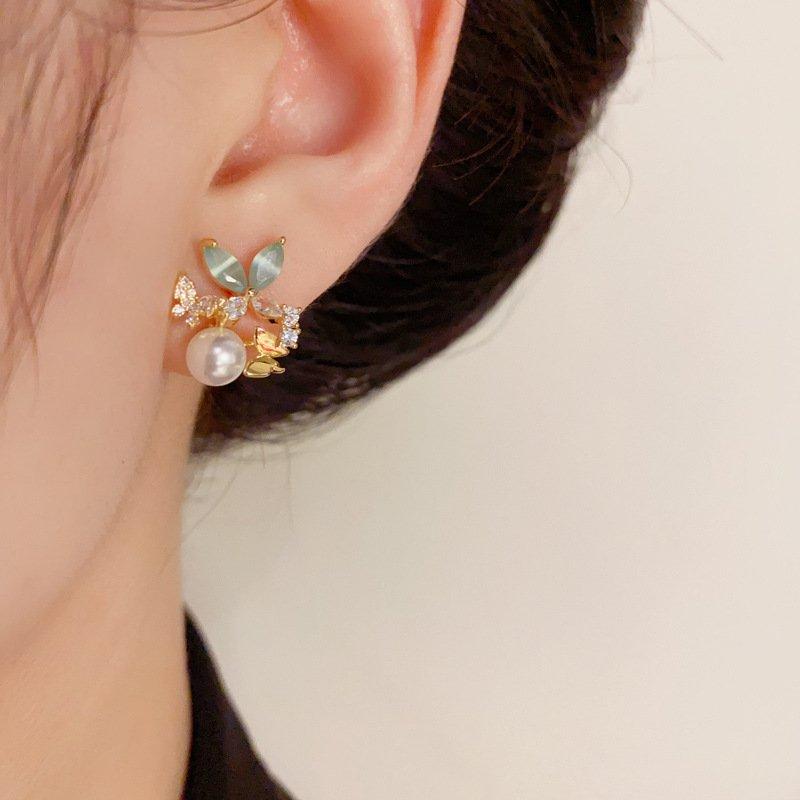 Japanese and Korean small fresh breeze zircon butterfly pearl earrings, niche luxury s925 silver stud post anti allergy female earrings and earrings