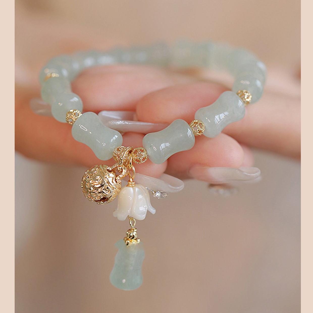 New Chinese style hollow mountain, new rain, Dongling stone bell bracelet, women's light luxury, niche exquisite bracelet, high-end feeling, best friend gift