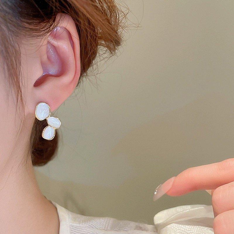 S925 Silver stud post Asymmetric Flower Earrings for Women, with a niche design sense, high-end temperament, light luxury, unique earrings, and ear accessories