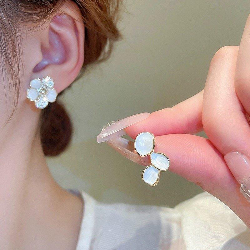 S925 Silver stud post Asymmetric Flower Earrings for Women, with a niche design sense, high-end temperament, light luxury, unique earrings, and ear accessories