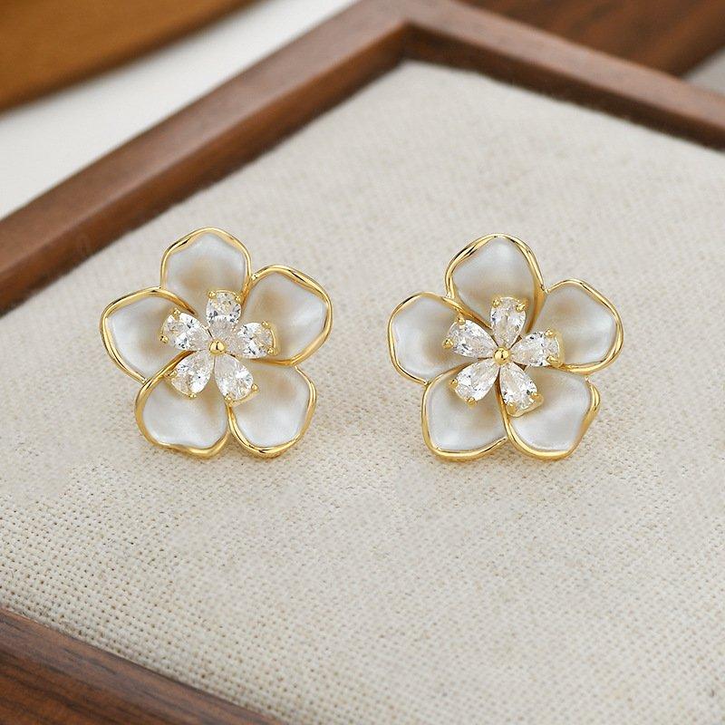 S925 Silver stud post Camellia Earrings, a new popular design with a sense of niche, light luxury, and atmospheric design. Women's anti allergic earrings