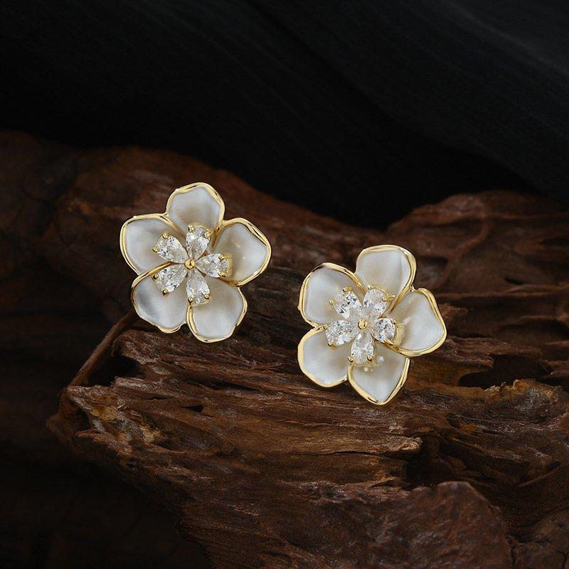 S925 Silver stud post Camellia Earrings, a new popular design with a sense of niche, light luxury, and atmospheric design. Women's anti allergic earrings