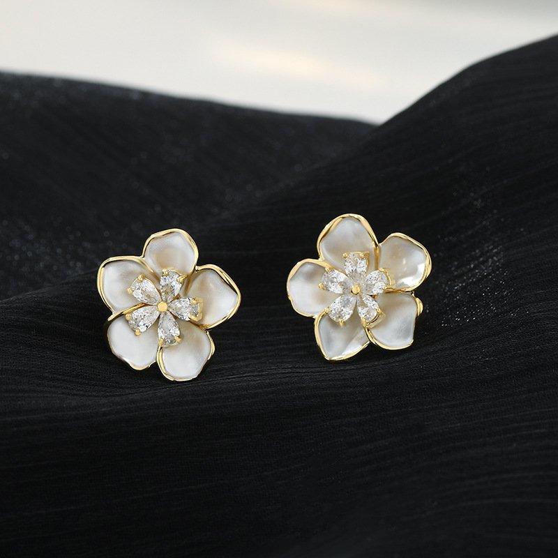 S925 Silver stud post Camellia Earrings, a new popular design with a sense of niche, light luxury, and atmospheric design. Women's anti allergic earrings