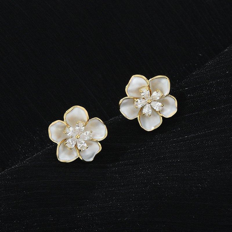 S925 Silver stud post Camellia Earrings, a new popular design with a sense of niche, light luxury, and atmospheric design. Women's anti allergic earrings