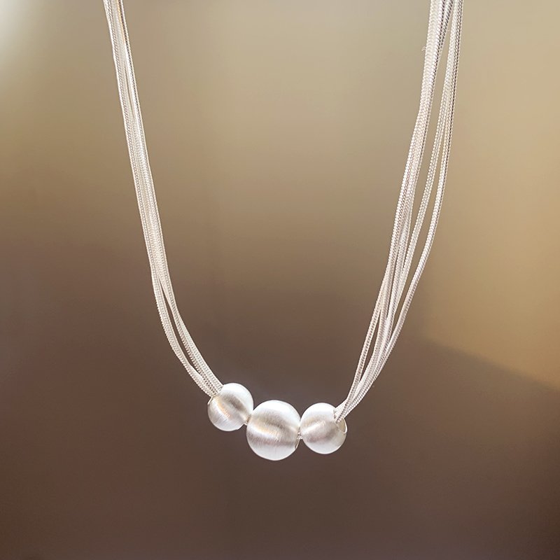 Brushed multi-layer pearl necklace for women, light luxury niche collarbone chain, 2024 new popular high-end necklace accessory