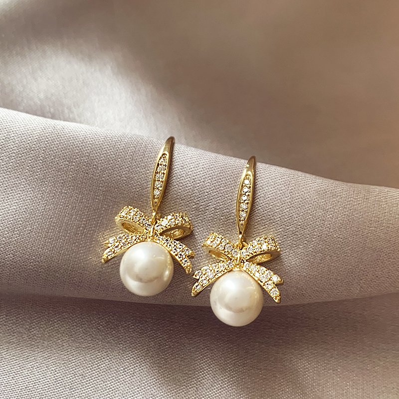 Butterfly Knot Pearl Earrings for Women 2024 New Popular Style High End Earrings with Light Luxury Charm Earrings and Earrings