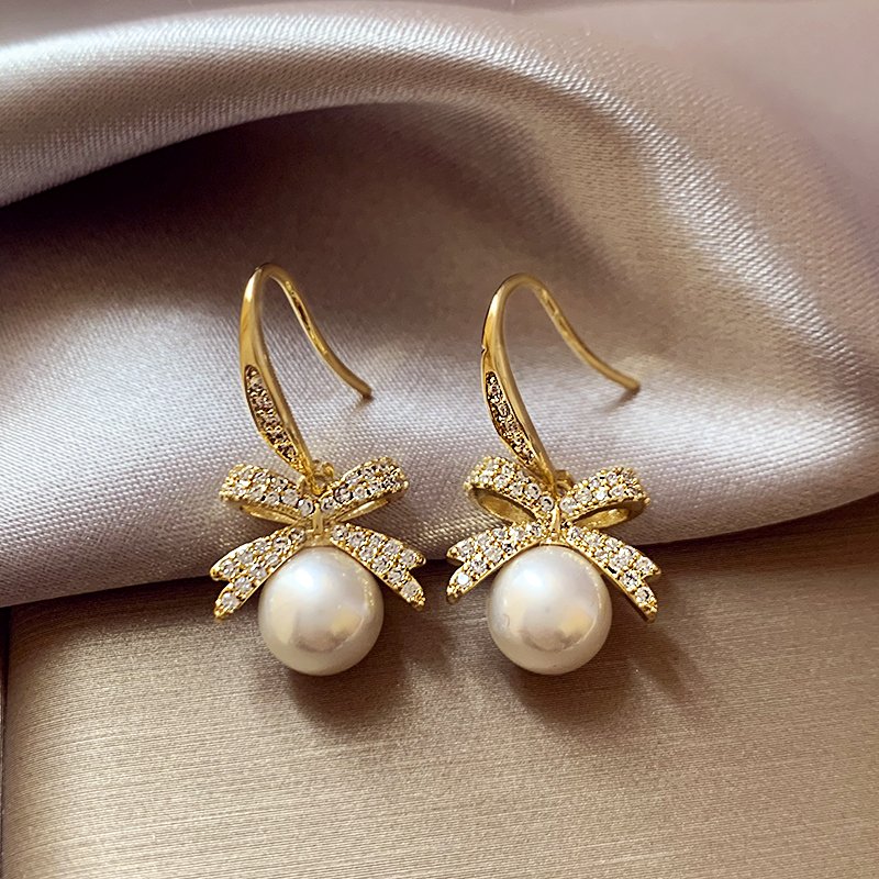 Butterfly Knot Pearl Earrings for Women 2024 New Popular Style High End Earrings with Light Luxury Charm Earrings and Earrings