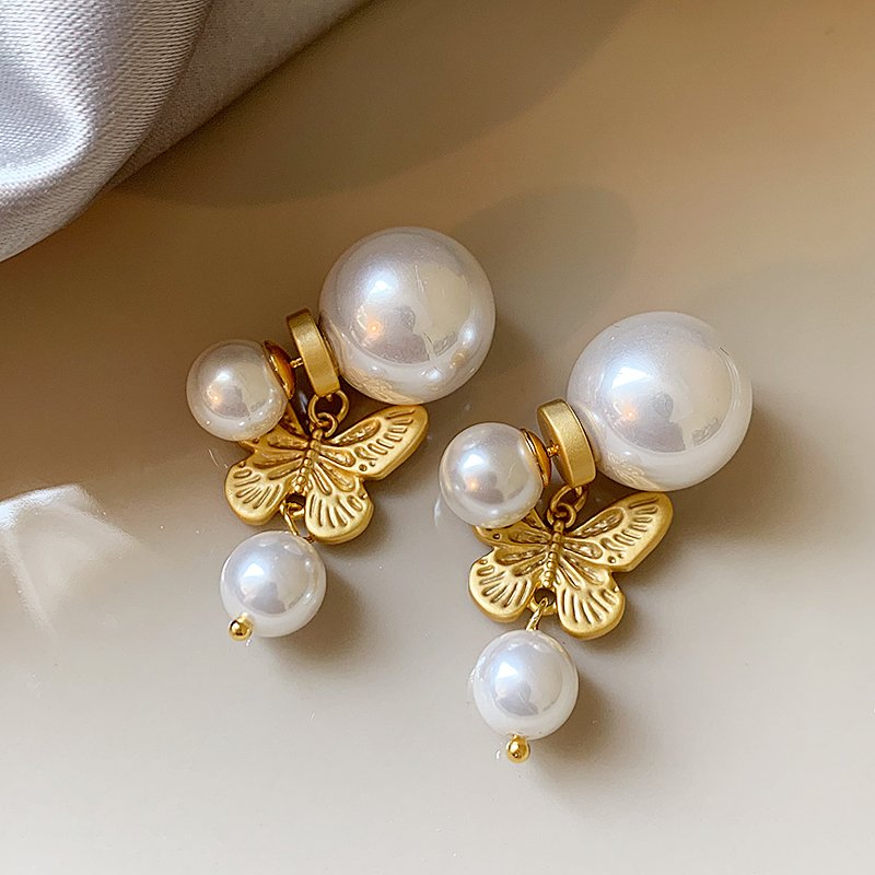 Butterfly double-sided pearl earrings, women's light luxury high-end earrings, 2024 new explosive style, niche and unique earrings