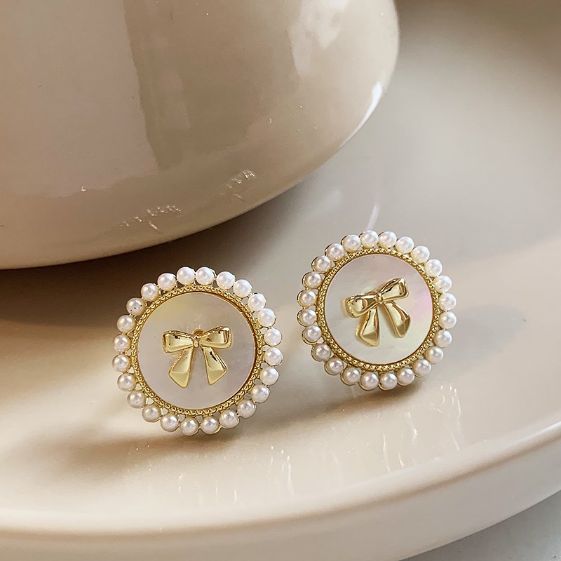 Butterfly knot pearl earrings for women, luxurious and high-end earrings, 2024 new popular pure silver stud post, niche and unique earrings