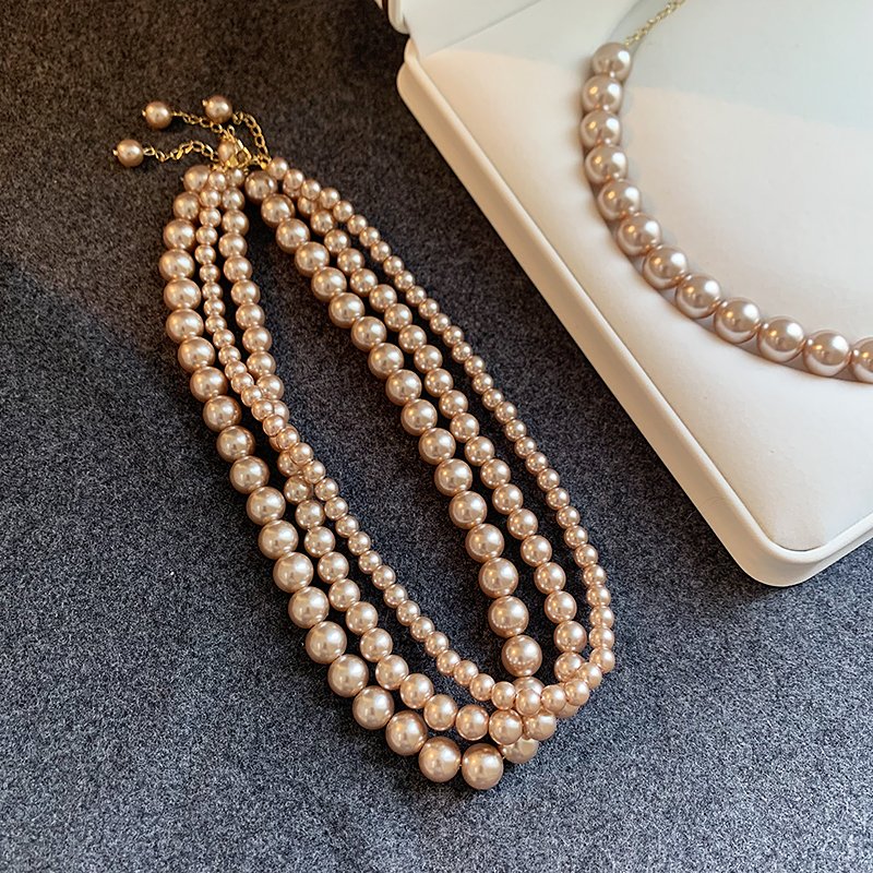 Champagne colored pearl necklace for women, light luxury, high-end feeling, collarbone chain, 2024 new popular necklace, niche neck accessory