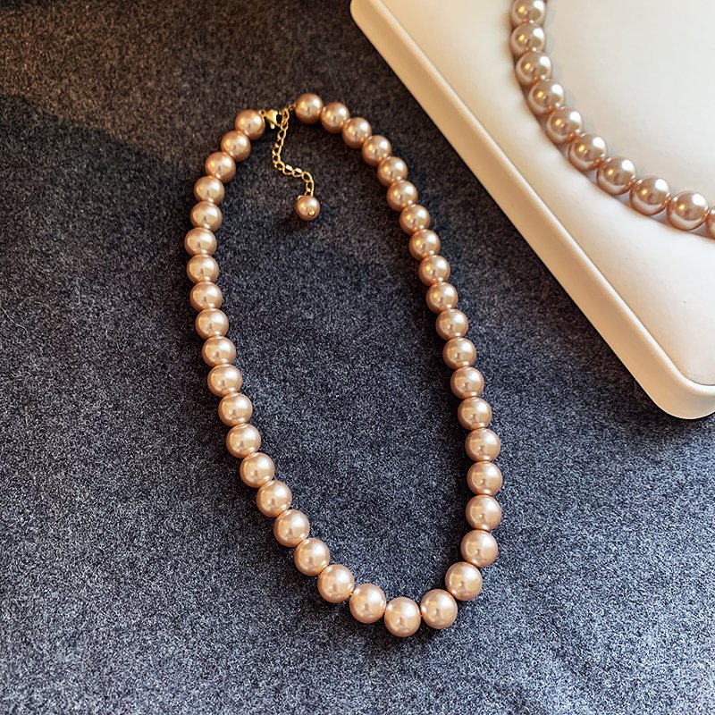 Champagne colored pearl necklace for women, light luxury, high-end feeling, collarbone chain, 2024 new popular necklace, niche neck accessory