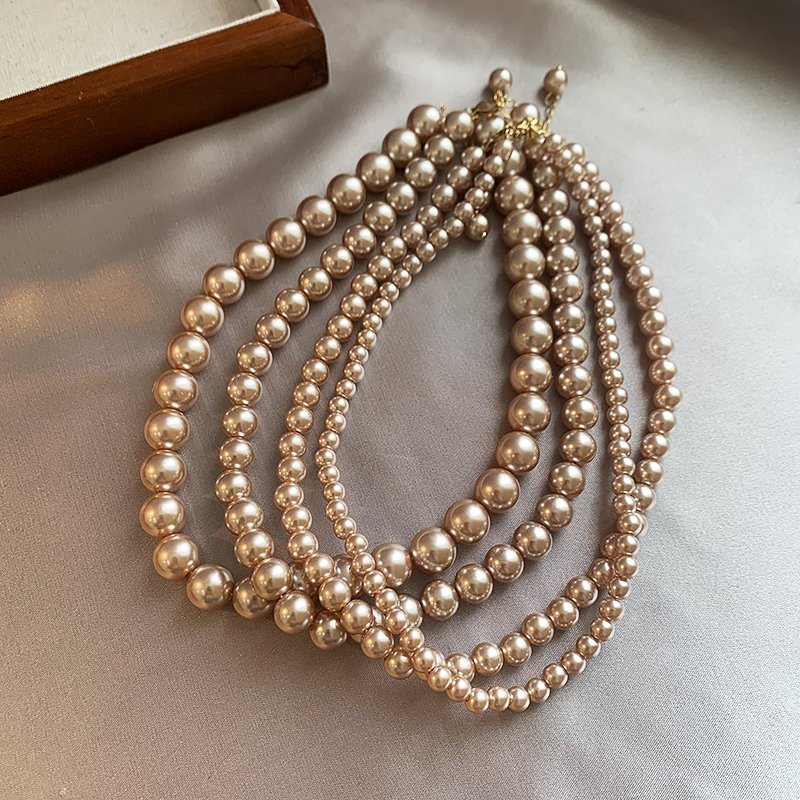 Champagne colored pearl necklace for women, light luxury, high-end feeling, collarbone chain, 2024 new popular necklace, niche neck accessory