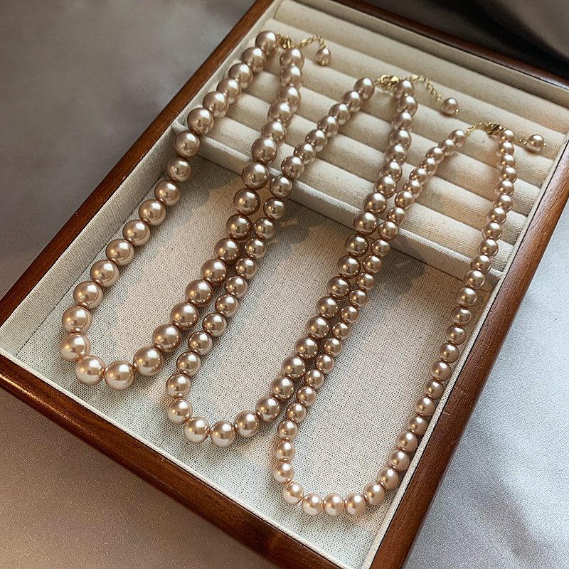 Champagne colored pearl necklace for women, light luxury, high-end feeling, collarbone chain, 2024 new popular necklace, niche neck accessory