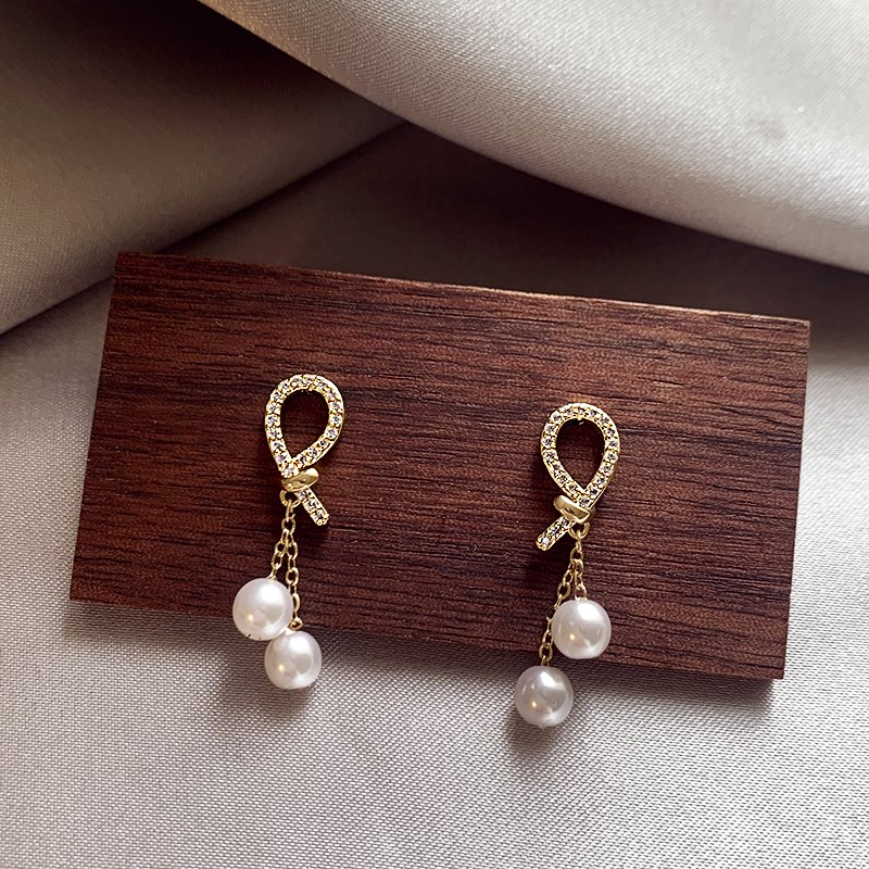 French full zirconia pearl earrings for women with a light luxury temperament, high-end earrings, 2024 new explosive unique earrings