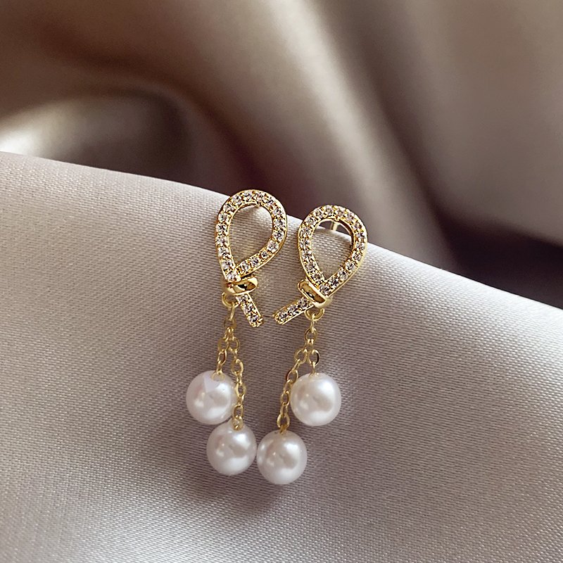 French full zirconia pearl earrings for women with a light luxury temperament, high-end earrings, 2024 new explosive unique earrings