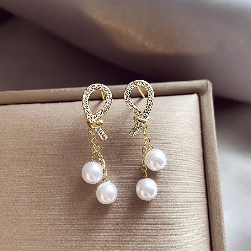 French full zirconia pearl earrings for women with a light luxury temperament, high-end earrings, 2024 new explosive unique earrings