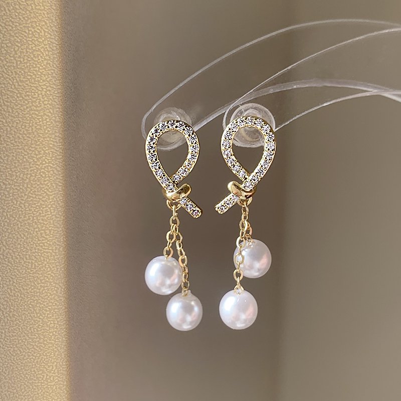 French full zirconia pearl earrings for women with a light luxury temperament, high-end earrings, 2024 new explosive unique earrings