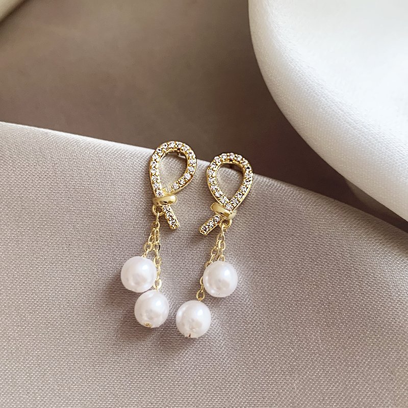 French full zirconia pearl earrings for women with a light luxury temperament, high-end earrings, 2024 new explosive unique earrings