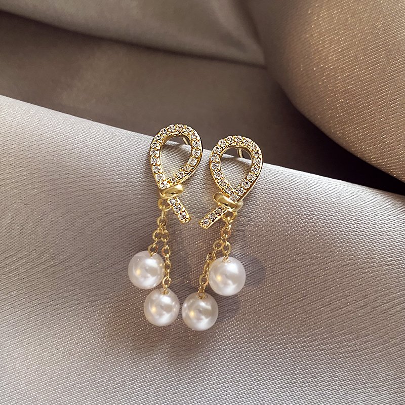 French full zirconia pearl earrings for women with a light luxury temperament, high-end earrings, 2024 new explosive unique earrings