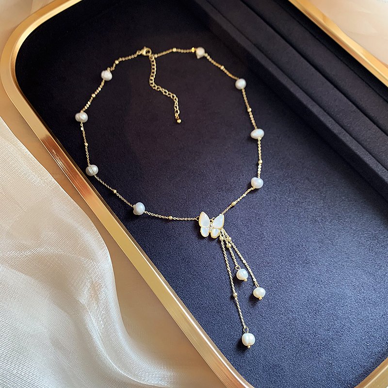 Freshwater pearl butterfly necklace for women, light luxury, niche collarbone chain, 2024 new popular high-end necklace accessory