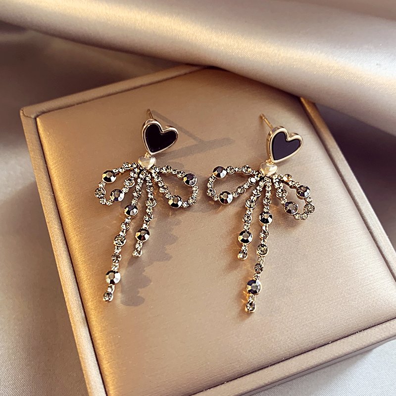 Love bow tassel earrings, women's light luxury high-end temperament earrings, 2024 new popular earrings