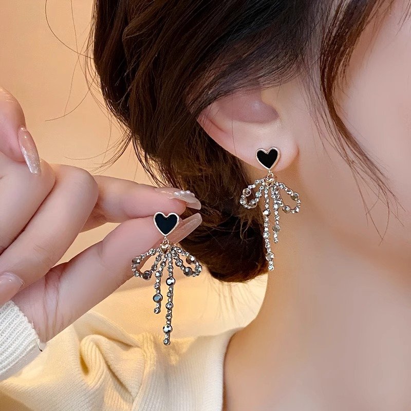 Love bow tassel earrings, women's long style, temperament earrings, 2024 new popular item, light luxury, high-end, unique earrings