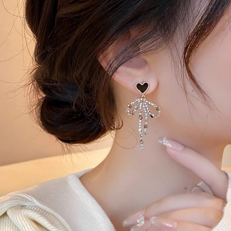 Love bow tassel earrings, women's long style, temperament earrings, 2024 new popular item, light luxury, high-end, unique earrings