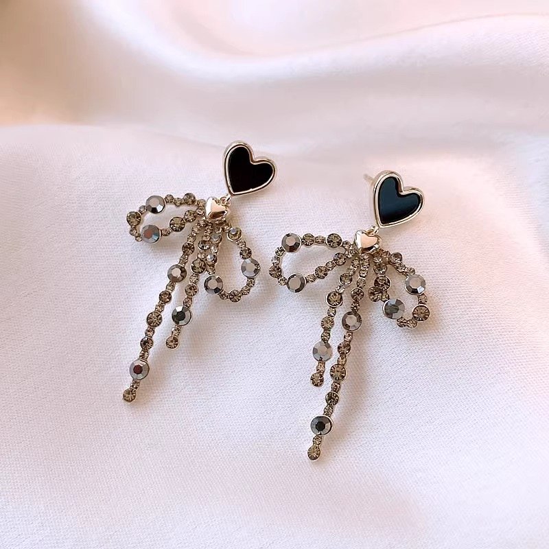 Love bow tassel earrings, women's long style, temperament earrings, 2024 new popular item, light luxury, high-end, unique earrings