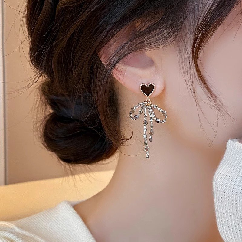 Love bow tassel earrings, women's long style, temperament earrings, 2024 new popular item, light luxury, high-end, unique earrings