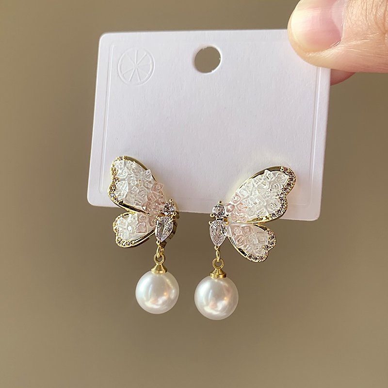 Pearl butterfly earrings, women's light luxury high-end temperament earrings, 2024 new popular unique ear accessories