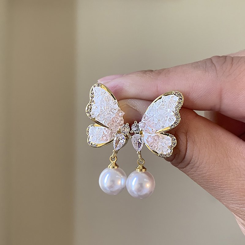 Pearl butterfly earrings, women's light luxury high-end temperament earrings, 2024 new popular unique ear accessories