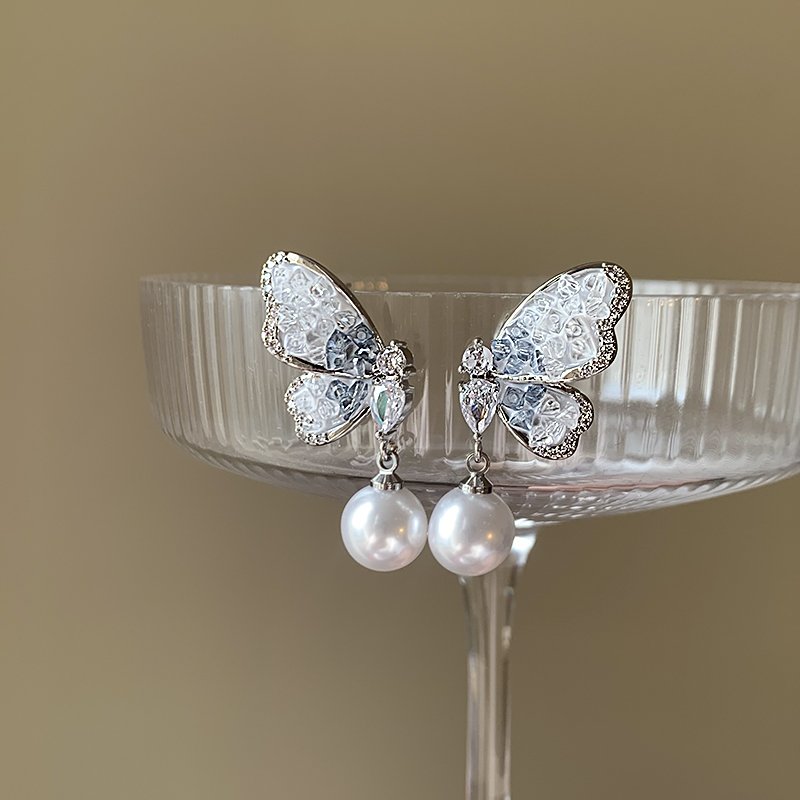 Pearl butterfly earrings, women's light luxury high-end temperament earrings, 2024 new popular unique ear accessories