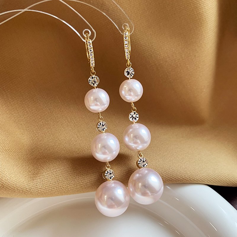 Pearl tassel earrings for women with a light luxury and high-end feel, 2024 new explosive style, unique temperament earrings