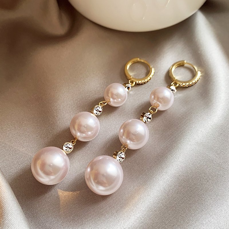 Pearl tassel earrings for women with a light luxury and high-end feel, 2024 new explosive style, unique temperament earrings