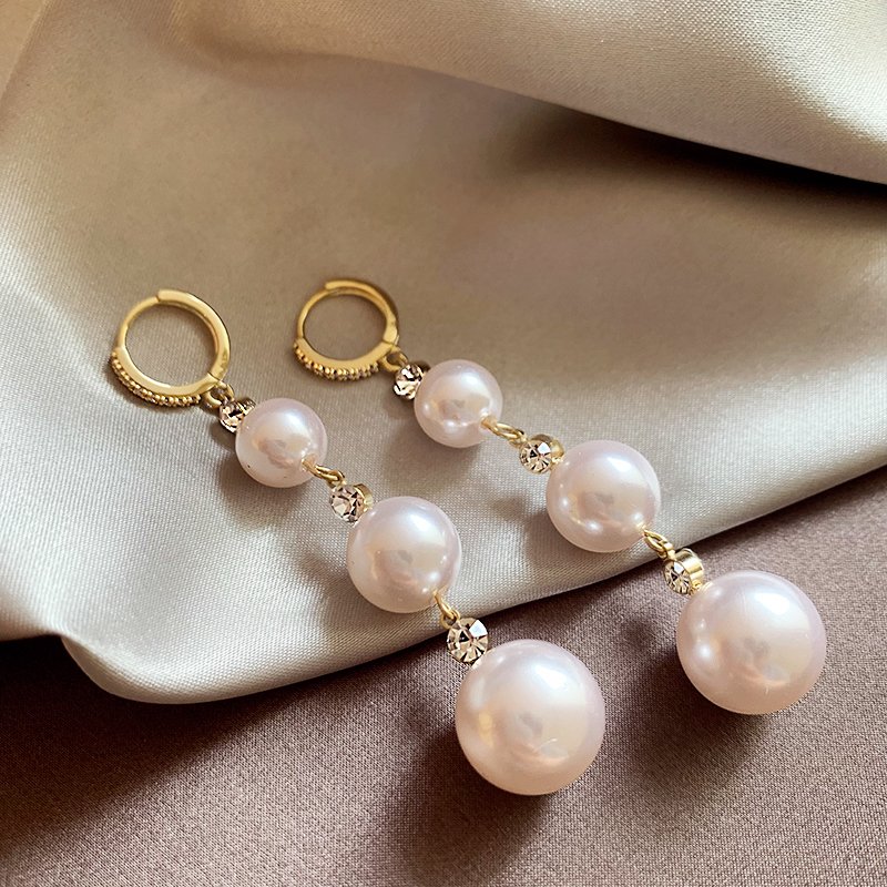 Pearl tassel earrings for women with a light luxury and high-end feel, 2024 new explosive style, unique temperament earrings