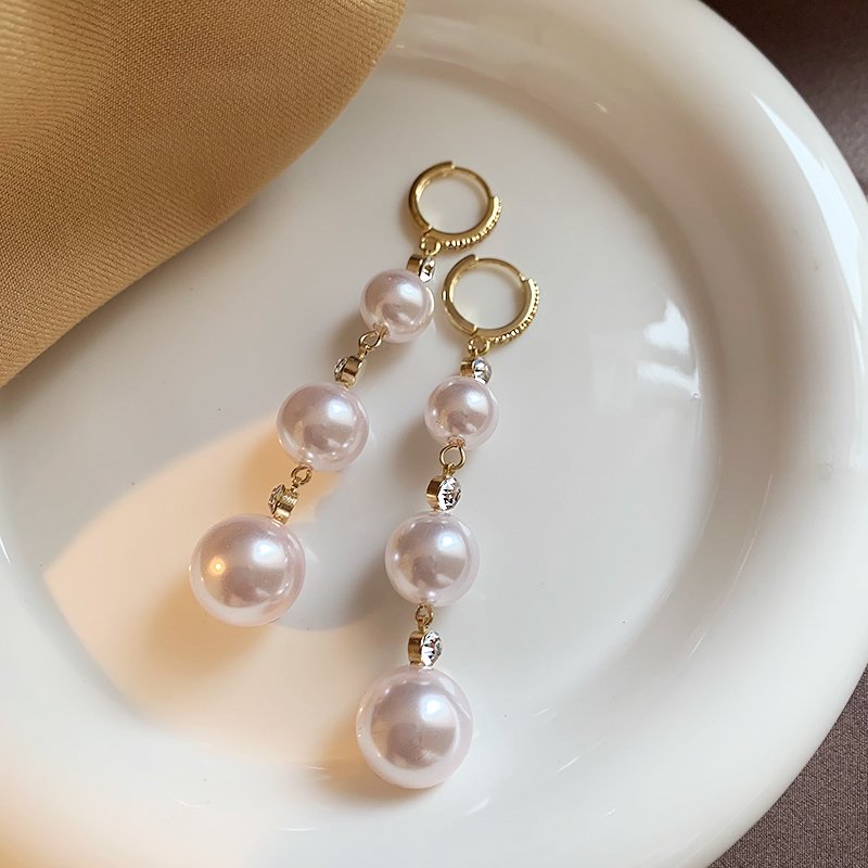 Pearl tassel earrings for women with a light luxury and high-end feel, 2024 new explosive style, unique temperament earrings