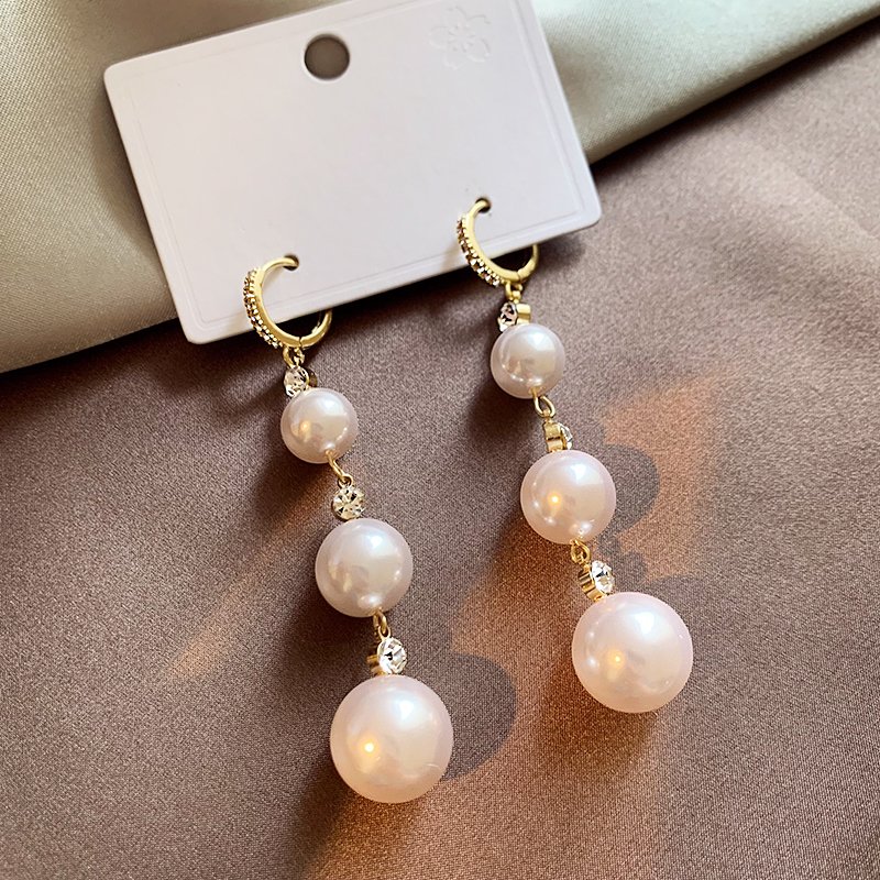 Pearl tassel earrings for women with a light luxury and high-end feel, 2024 new explosive style, unique temperament earrings