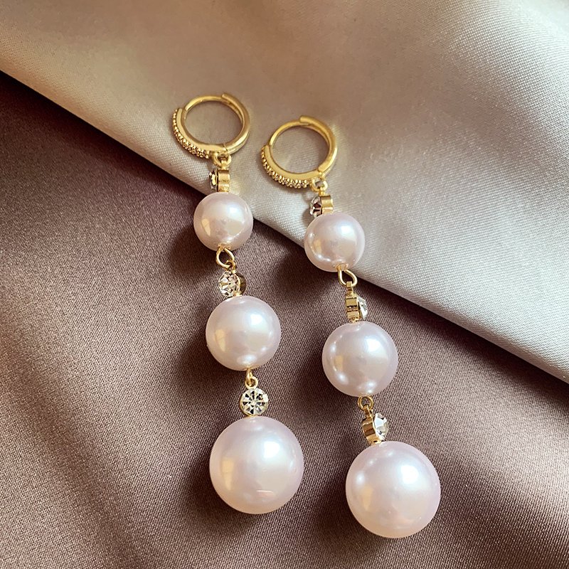 Pearl tassel earrings for women with a light luxury and high-end feel, 2024 new explosive style, unique temperament earrings