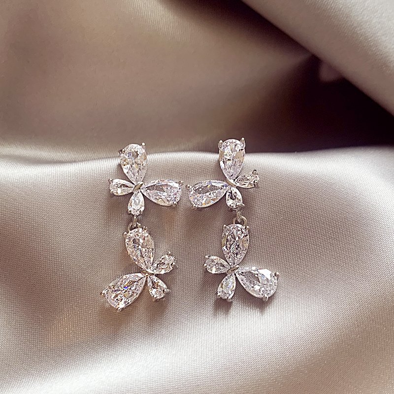 Silver zircon butterfly earrings for women with a high-end feel and a light luxury temperament. Earrings with 2024 new popular and unique earrings