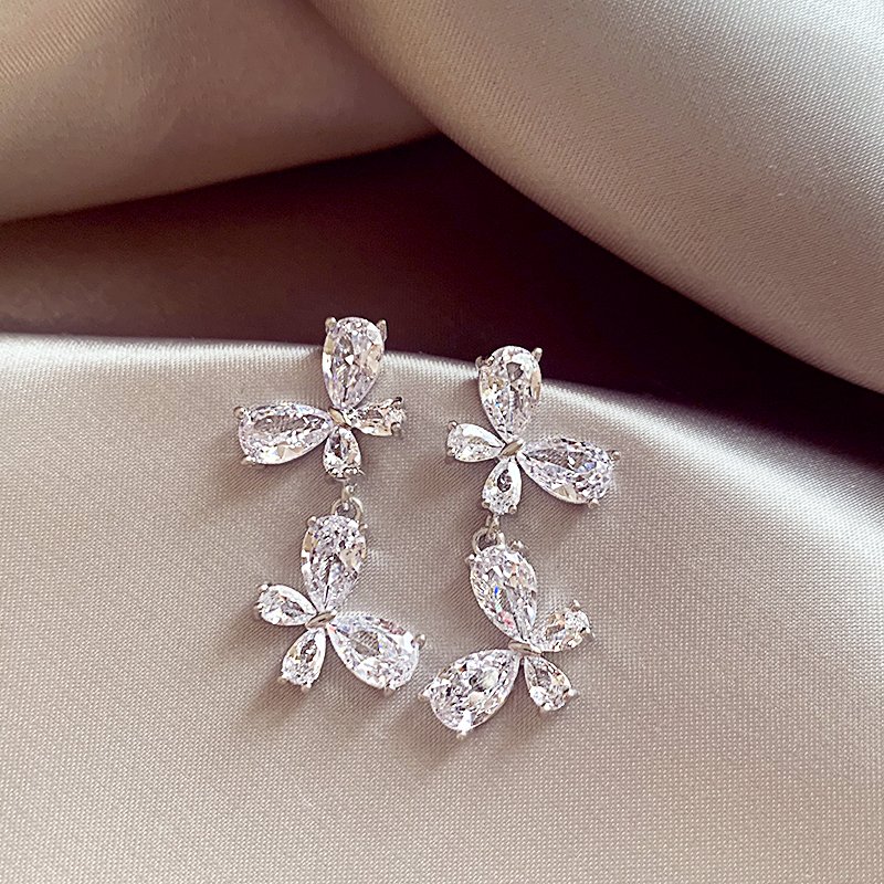 Silver zircon butterfly earrings for women with a high-end feel and a light luxury temperament. Earrings with 2024 new popular and unique earrings