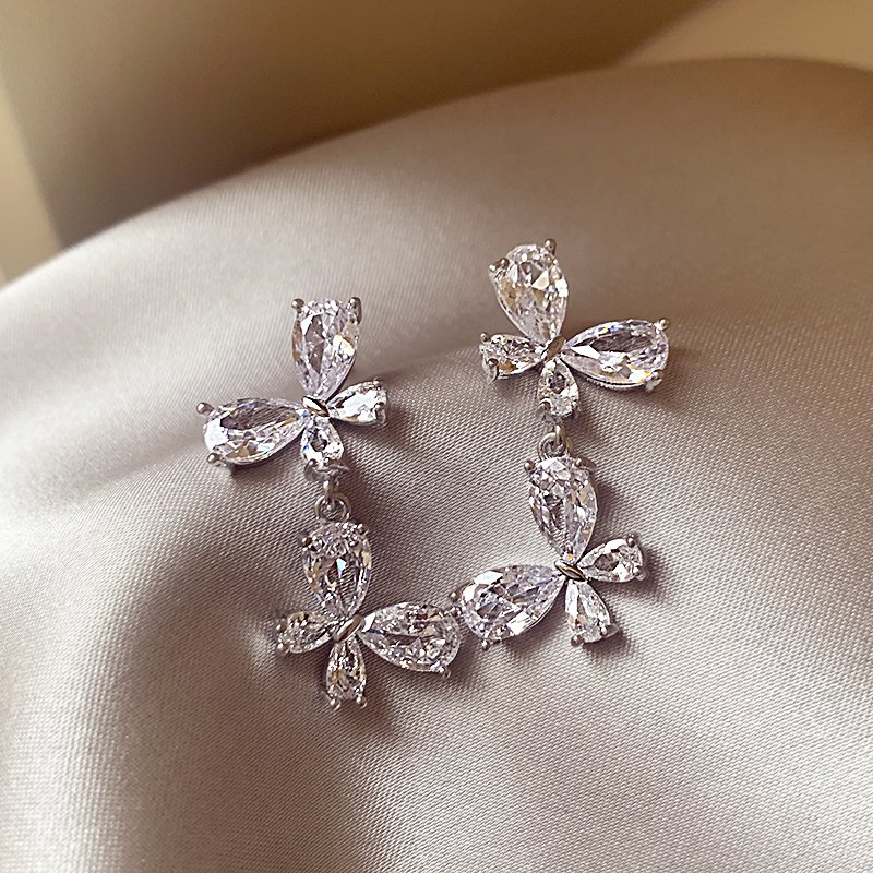 Silver zircon butterfly earrings for women with a high-end feel and a light luxury temperament. Earrings with 2024 new popular and unique earrings