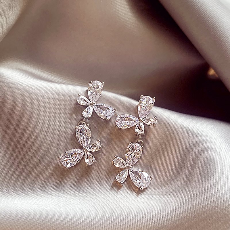 Silver zircon butterfly earrings for women with a high-end feel and a light luxury temperament. Earrings with 2024 new popular and unique earrings