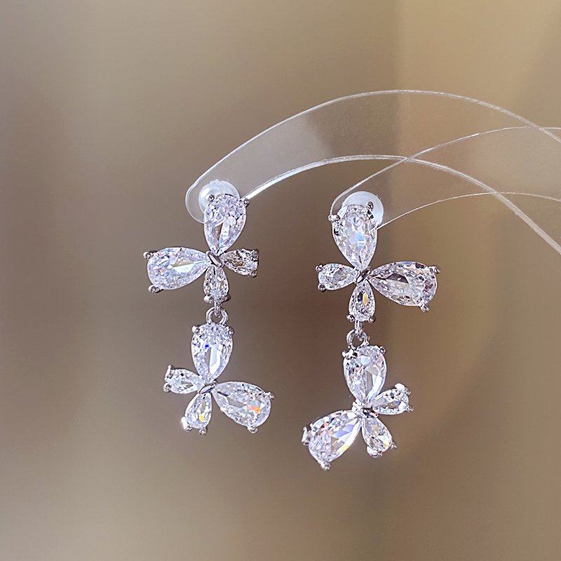 Silver zircon butterfly earrings for women with a high-end feel and a light luxury temperament. Earrings with 2024 new popular and unique earrings