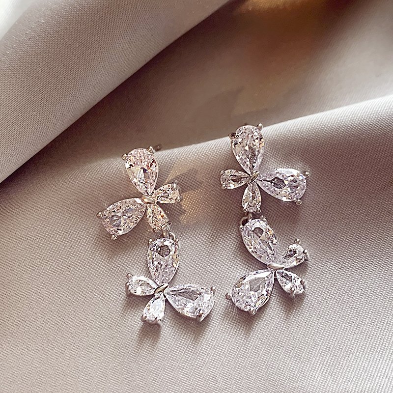 Silver zircon butterfly earrings for women with a high-end feel and a light luxury temperament. Earrings with 2024 new popular and unique earrings